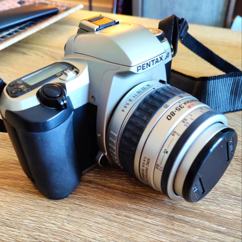 Pentax ZX -30 35mm camera with travel case.